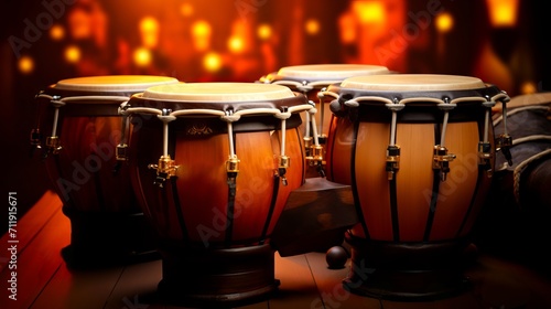 Conga drums on stage, lit by warm stage lights with bokeh effect. Ideal for music themed projects and performance promotions. Traditional percussion musical instrument of Afro-Cuban
