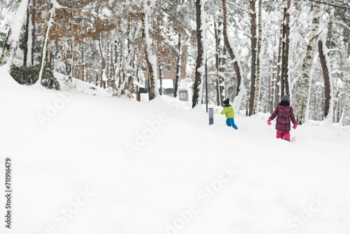 Kids Playing on Snow in Winter Time