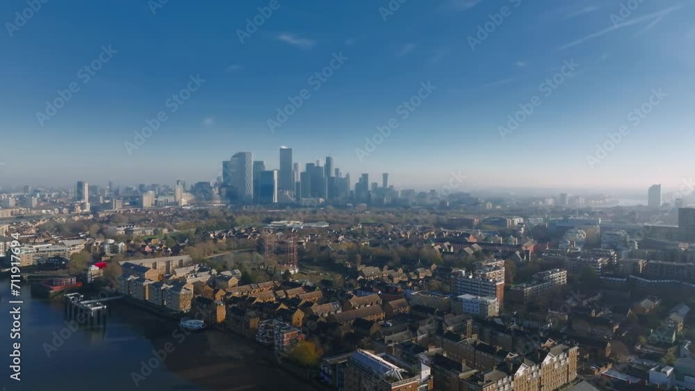 Aerial Panoramic view of Canary Wharf, financial hub in London, UK. Beautiful city of London. Aerial Panoramic view of Canary Wharf, financial hub in London, UK. Beautiful city of London.