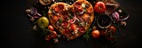 a heart shaped pizza with toppings on a table next to tomatoes