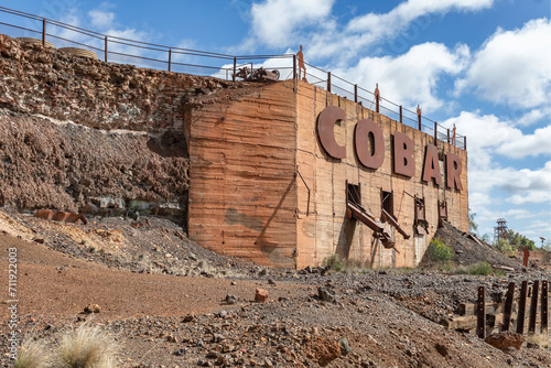 Sign on the old mine wall at the entrance to the historic copper mining town of Cobar, NSW, Australia