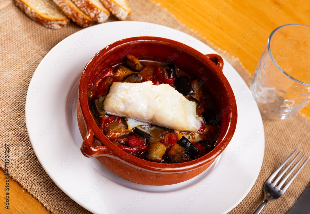 Bacalao is a popular dish Portuguese cuisine made from cod with stewed vegetables
