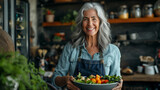 Senior woman holding a bowl of healthy food 