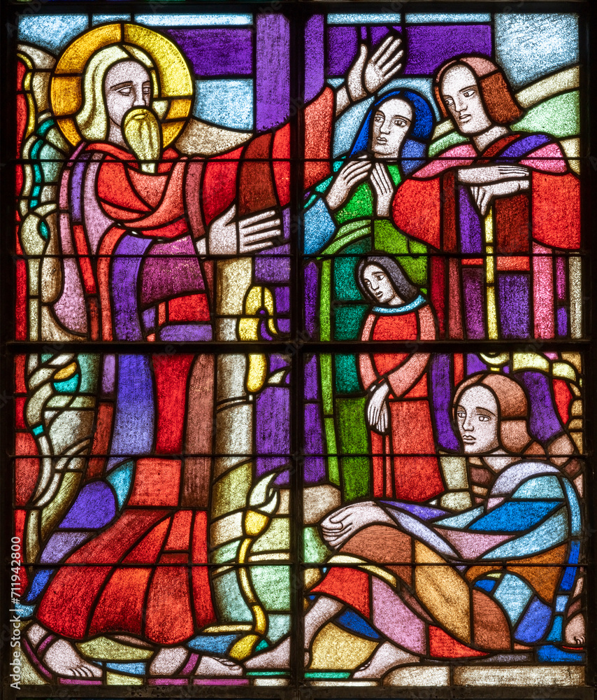 BERN, SWITZERLAND - JUNY 27, 2022: The St. Beatus on the stained glass in the church Dreifaltigkeitskirche by Jean-Edouard de Castella (1881–1966). 