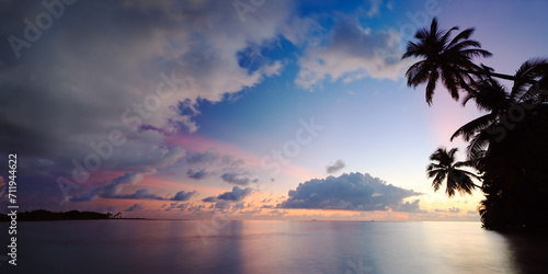 Panoramic of beautiful sunset over island in the Maldives photo