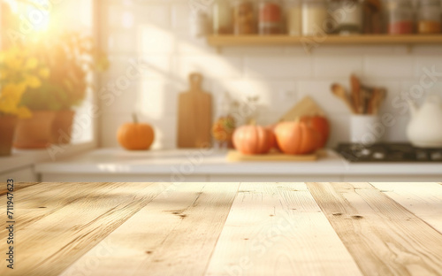 Table in rustic autumn kitchen with sunlight and copy space photo