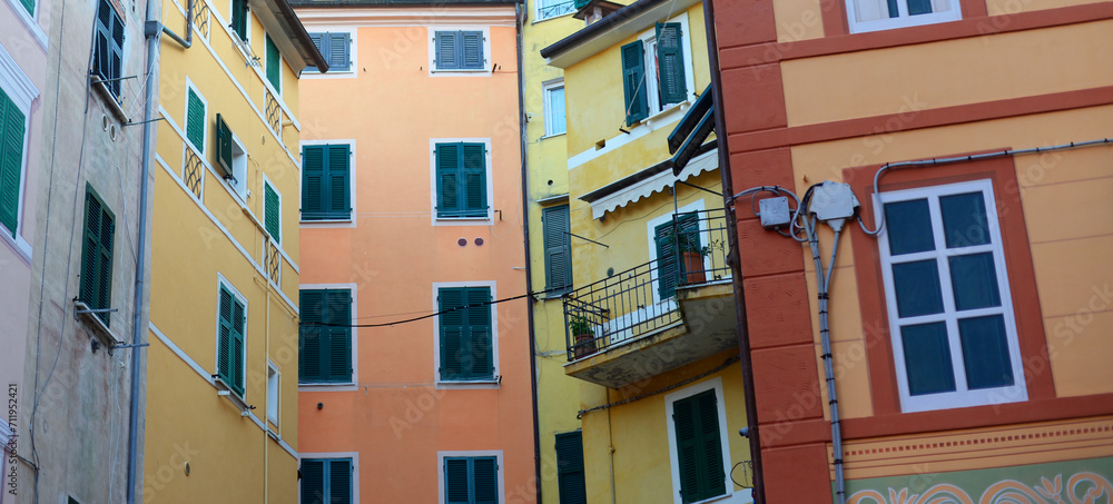 Detail of colourful houses in the city centre of Lerici, bay of the poets, La Spezia, Liguria on a summer evening