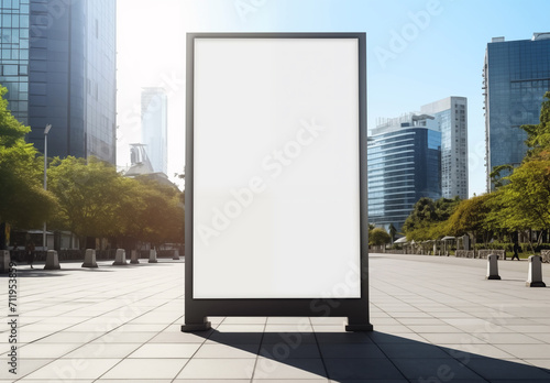 Vertical banner, billboard, sign on city streets with a white background. Megapolis, skyscrapers, square, pedestrian zone. Outdoor advertising, placement of text and design to sell goods and services.