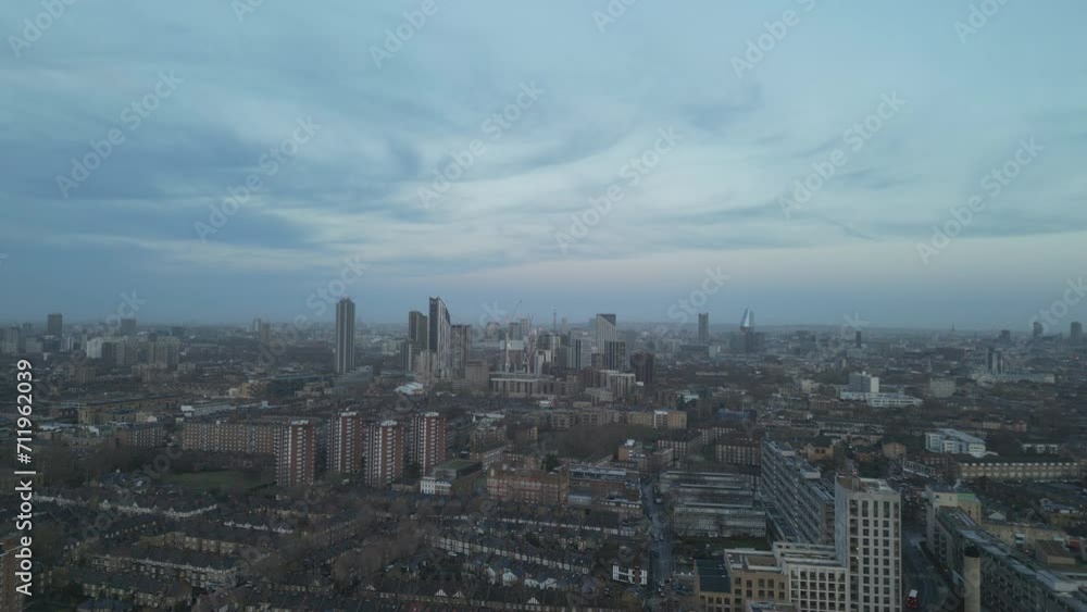 Aerial view of the gloomy London suburbs in the twilight. Aerial view of the gloomy London suburbs in the twilight.