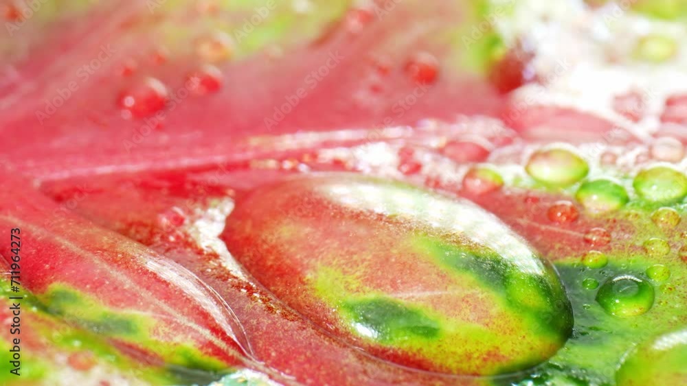 Exquisite video showcases the stunning details of water droplets delicately resting on A macro video captures the sparkling water drops on wet pink green leaves.
Exquisite video showcases the stunning details of water droplets delicately resting on A macro video captures the sparkling water drops on wet pink green leaves.
