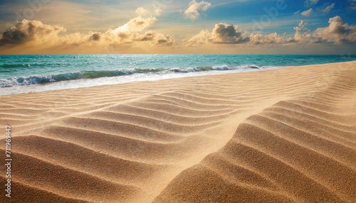 The sunset on the sand texture beach.