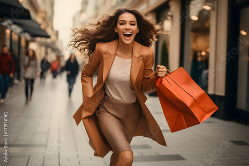 in a lively moment, holding shopping bags and seemingly enjoying a shopping spree in mall, They are holding multiple shopping bags photo