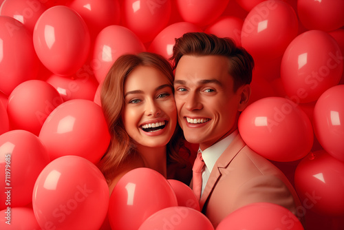 Portrait of happy thirtysomething couple looking at camera surrounded by coral colored balloons, studio photography. Anniversary, valentines day concept. Generative AI photo