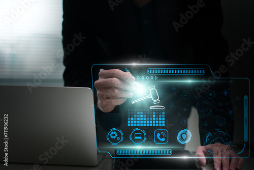 Obraz na plátně Businessman using tablet and computer Online bidding using artificial intelligen