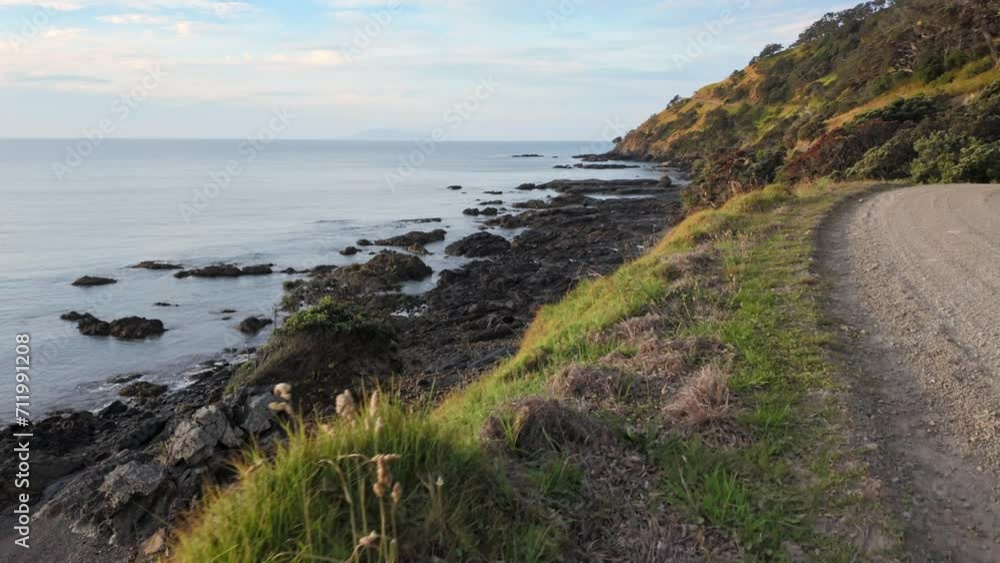 Rocky coastline and the ocean in Port Jackson, Coromandel Peninsula, New Zealand. Rocky coastline and the ocean in Port Jackson, Coromandel Peninsula, New Zealand.