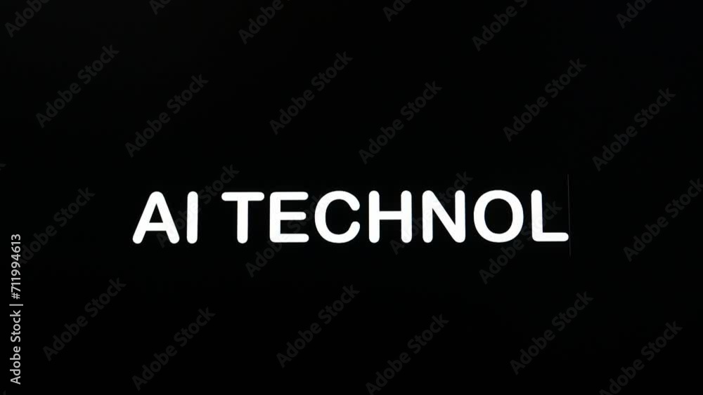 Writing on the screen with a flashing paragraph forming the word ai technology, in white on a black background Writing on the screen with a flashing paragraph forming the word ai technology, in white on a black background