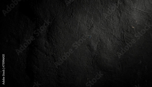 black rough texture abstract background showcases the raw elegance of a cement wall, evoking strength and urban sophistication 