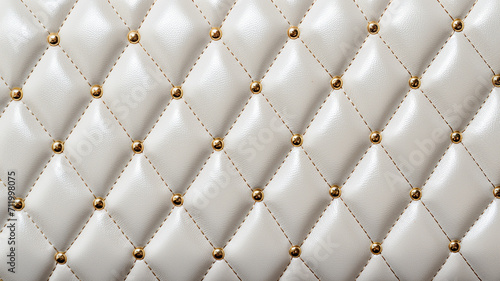 white diamond pattern embossed leather pattern with gold diamond detail, puffy foam leather for purse. photo