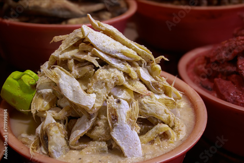 Khmer fermented fish maw called prahok and pa ok sold on the local market showing the authentic traditional cuisine and culture of Cambodia photo