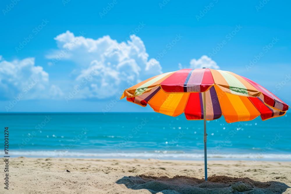 Beach Umbrella on Sandy Shore with Ocean Backdrop