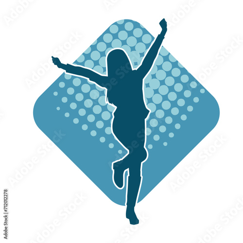 Silhouette of a female dancer in action pose. Silhouette of a woman dancing happily.