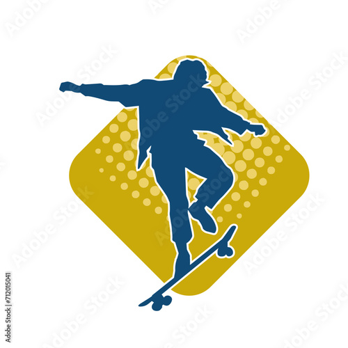 Silhouette of a male in action pose on skateboard. Silhouette of an urban boy on skateboard.