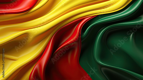 Abstract Colorful Silk Wave Fabric in Green, Yellow, and Red colors. Black History Month Concept Background