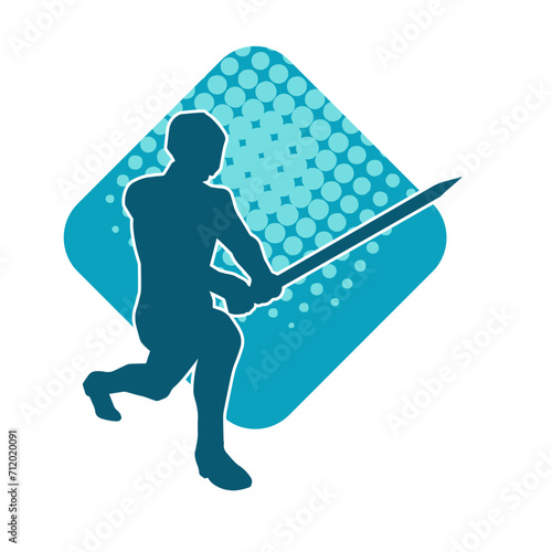 Silhouette of a male warrior in action pose with sword weapon. Silhouette of a man fighter carrying sword weapon.
