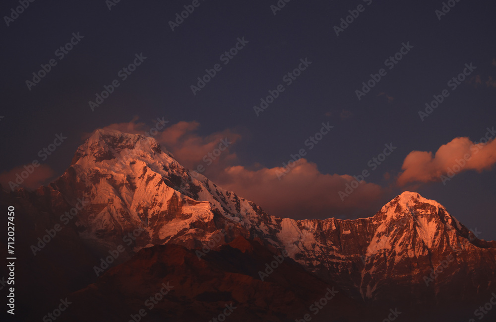 Annapurna south located in Annapurna mountain range in Nepal during afterglow