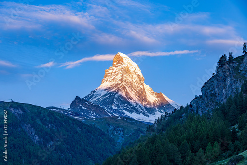 Matterhorn seen from Zermatt at sunrise when the mountain is turning golden