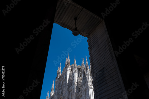 Architectural detail of The Milan Cathedral (Italian, Duomo di Milano), the cathedral church of Milan in Lombardy, Italy. Dedicated to the Nativity of St Mary it is the seat of the Archbishop of Milan