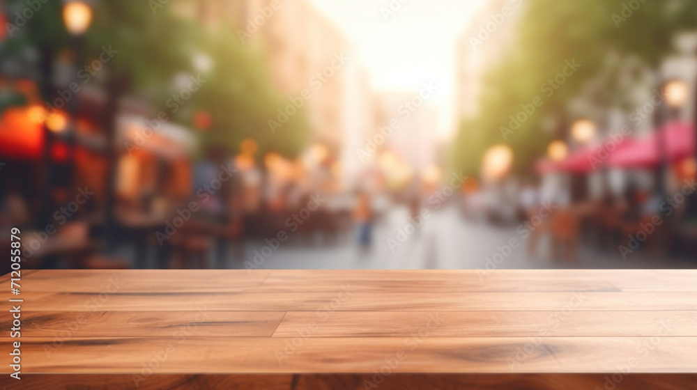 Empty wooden tabletop with a blurred background of a bustling street scene in a city.