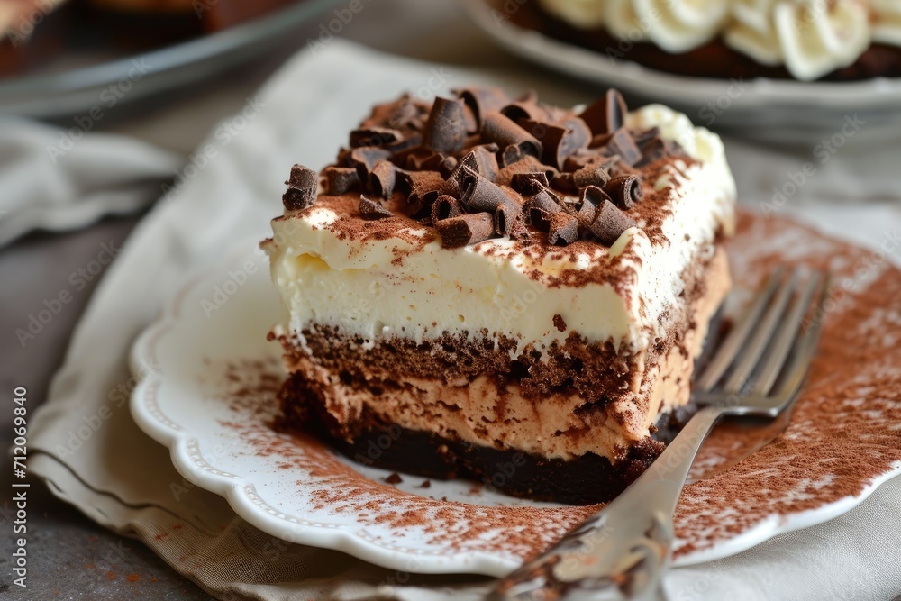 Tiramisu and chocolate cheesecake on a dark background. Tiramisu and chocolate cheesecake on a dark background.