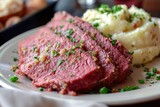 Corned beef is served with mashed potatoes.