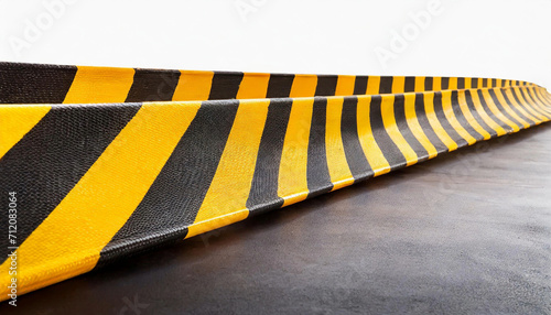 Distressed yellow and black barricade tape photo