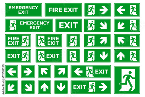 Exit sign set. Emergency and fire exit icons. Man running out arrow, green background. photo