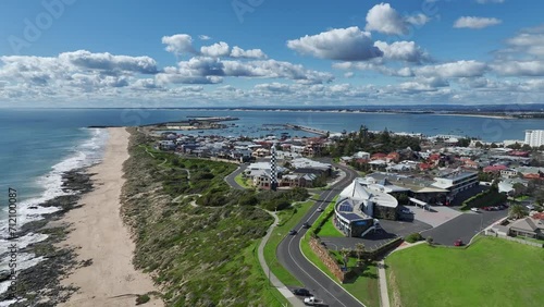 Bunbury, Western Australia - Dynamic aerial drone video of city along western coast of Australia with view of the Bunbury Lighthouse and Marlston Hill Lookout