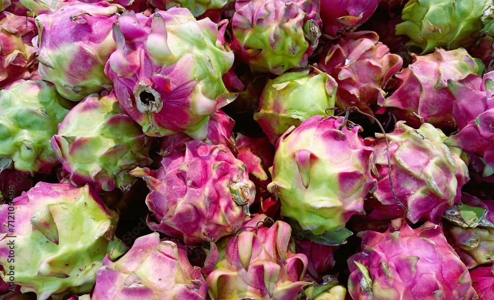 pile of fresh green and red dragon fruit pile of fresh green and red dragon fruit