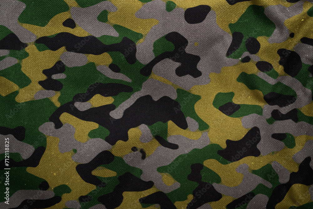green , yellow and grey woodland army camouflage tarp texture , camo fabric background green , yellow and grey woodland army camouflage tarp texture , camo fabric background