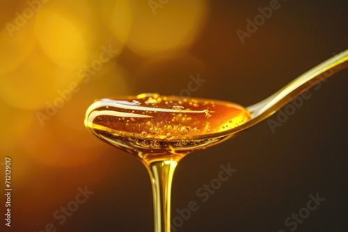 Macro photography of a drizzle of honey on a spoon, emphasizing the golden color and viscous texture