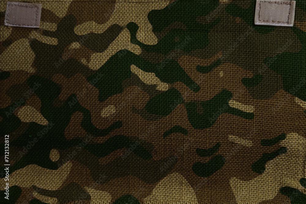 Fototapeta premium army camouflage burlap canvas with velcro straps patches