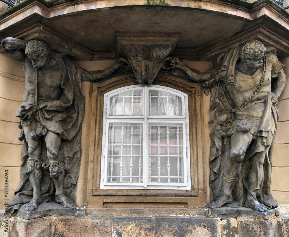 Fototapeta premium Baroque palace with muscular Moorish men supporting a balcony
