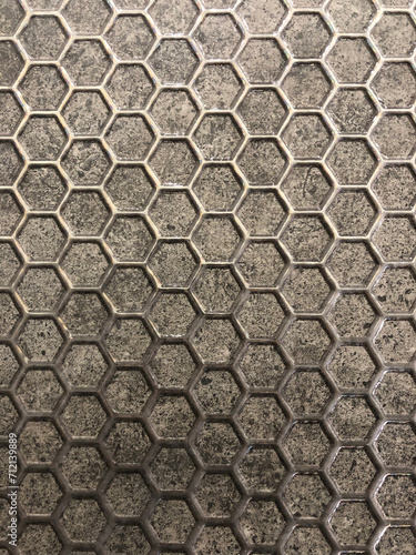 Ceramic tile with honeycomb pattern