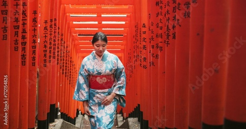 Woman, Japanese and walking at temple in traditional kimono or Tokyo for worship, respect or faith. Female person, shinto building and stairs for heritage peace or outdoor journey, travel or history photo