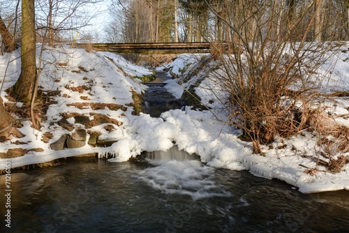 Output of the mill drive in winter. River Juhyne. Komarno. Eastern Moravia. Czechia.