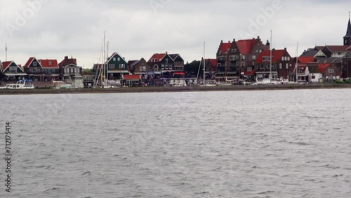 Volendam, The Netherlands - June 18, 2016: Volendam, small village at Markermeer in Netherlands In former times Volendam was a fishing village but today they make their money with tourism. photo