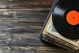 Flat lay of modern vinyl records on wooden background with space for text