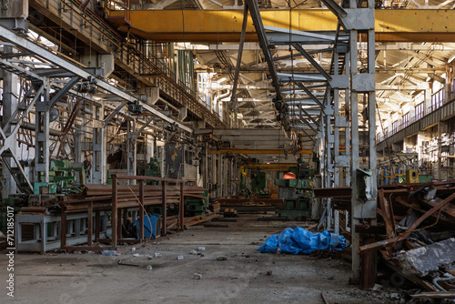Fototapeta Naklejka Na Ścianę i Meble -  Destroyed and abandoned mechanical plant during war in Ukraine.