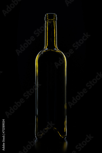 green wine bottle silhouette on isolated black background