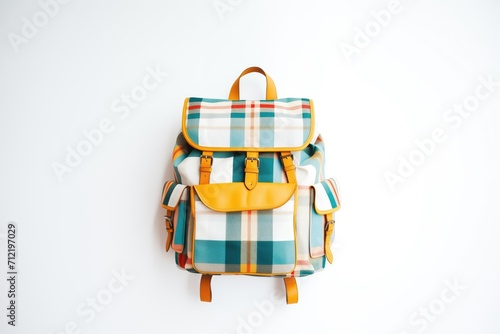 plaid patterned backpack on white, shot from above